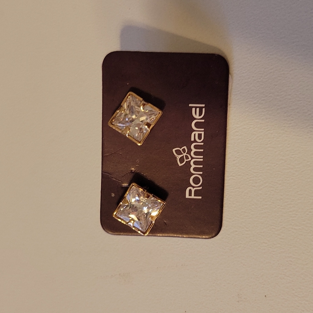 Gold peace earrings